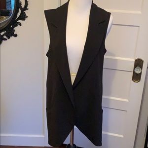 Long fitting suited vest
